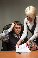 Image showing Elegant secretary and boss work with documents