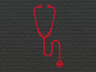 Image showing Healthcare concept: Stethoscope on wall background