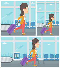 Image showing Woman walking with suitcase at the airport.