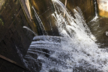 Image showing old leaking dam