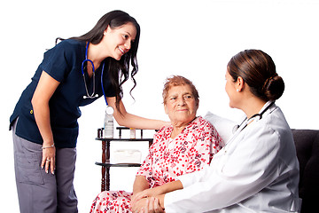 Image showing Doctor and Nurse consulting Senior Patient
