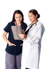 Image showing Doctor and Nurse discussing Patient medical chart