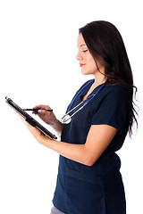Image showing Nurse writing digital patient chart