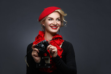 Image showing Beautiful lady with retro photo camera
