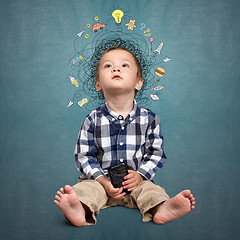 Image showing Little boy thinking