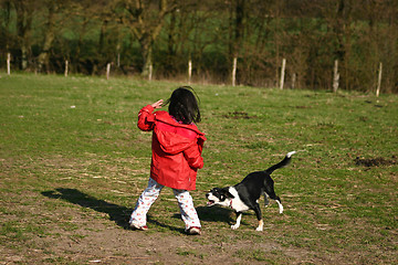 Image showing Child and dog