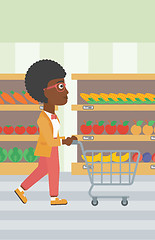 Image showing Customer with shopping cart vector illustration.