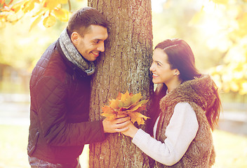 Image showing romantic couple playing in the autumn park