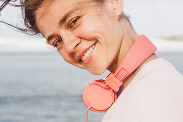 Image showing Woman walking on the beach