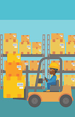 Image showing Warehouse worker moving load by forklift truck.