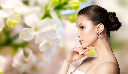 Image showing close up of beautiful woman face with earring