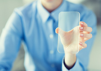 Image showing close up of woman with transparent smartphone