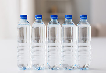 Image showing close up of plastic bottles with drinking water