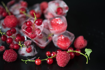 Image showing Frozen berries on wooden table