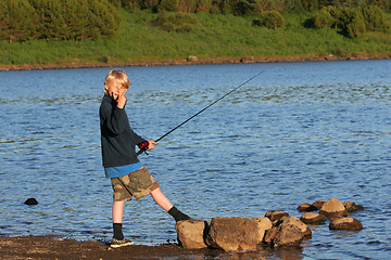 Image showing wetting the hook