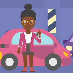 Image showing Woman holding keys to her new car.