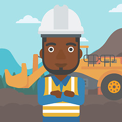 Image showing Miner with mining equipment on background.