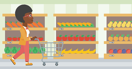 Image showing Customer with shopping cart vector illustration.