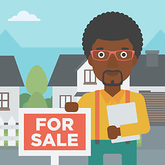 Image showing Real estate agent offering house.