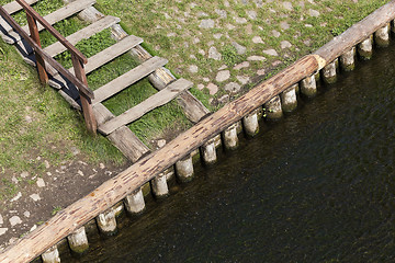 Image showing old leaking dam