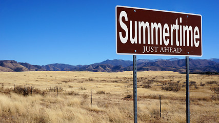 Image showing Summertime Just Ahead brown road sign