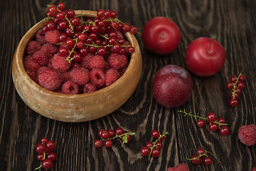 Image showing Fresh berries on wooden table