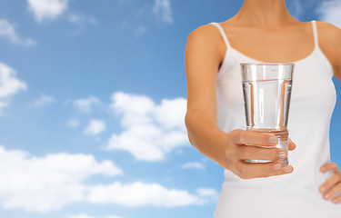 Image showing woman hand holding glass of water