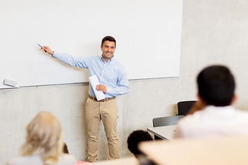 Image showing group of students and teacher on lecture