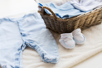 Image showing close up of baby clothes for newborn boy in basket