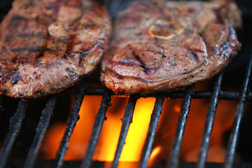 Image showing flaming meat