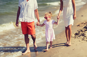 Image showing happy family in sunglasses on summer beach