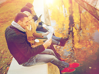 Image showing couples with tourist map in autumn park