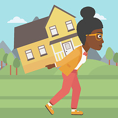 Image showing Woman carrying house vector illustration.