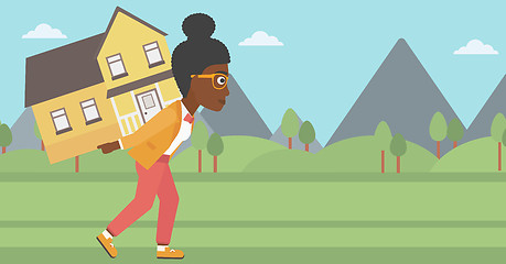 Image showing Woman carrying house vector illustration.