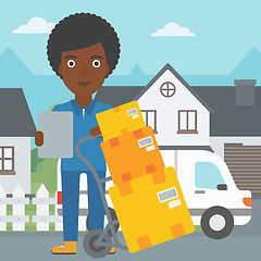 Image showing Delivery woman with cardboard boxes.