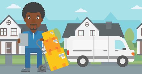 Image showing Delivery man with cardboard boxes.