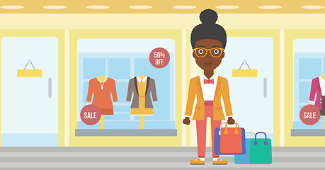 Image showing Happy woman with bags vector illustration.