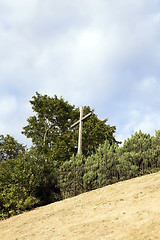 Image showing wooden cross near the church