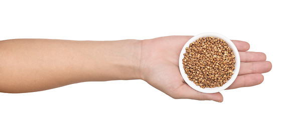 Image showing hand with buckwheat