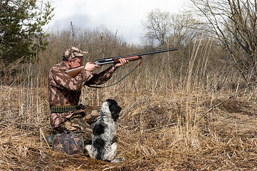 Image showing Hunter with a dog