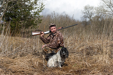 Image showing Hunter with a dog