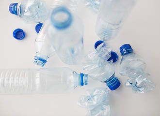 Image showing close up of empty used plastic bottles on table