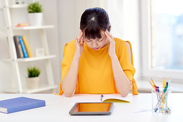 Image showing tired asian woman student with tablet pc at home