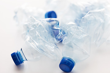 Image showing close up of empty used plastic bottles on table