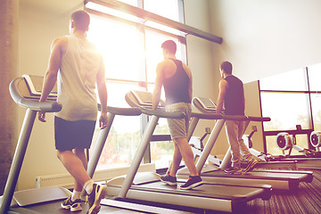 Image showing men exercising on treadmill in gym