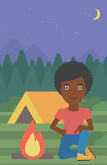 Image showing Woman kindling campfire vector illustration.