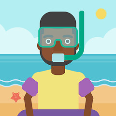 Image showing Man with snorkeling equipment on the beach.