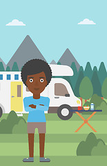 Image showing Woman standing in front of motor home.