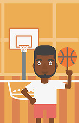 Image showing Basketball player spinning ball.