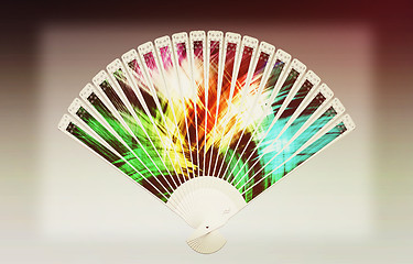 Image showing Colorful hand fan . 3D illustration. Vintage style.